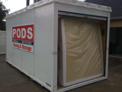 packing and loading 16 foot Pods Container By Packing Service Inc