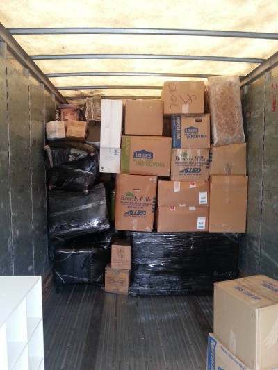 Packing Service, Inc. Loading ABF U-Pack trailer 2