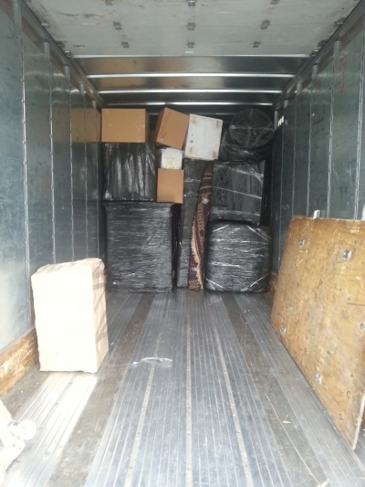 Packing Service, Inc. Loading ABF U-Pack trailer 1