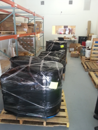 Shrink Wrapping and preparing for shipping by Packing Service, Inc. 4